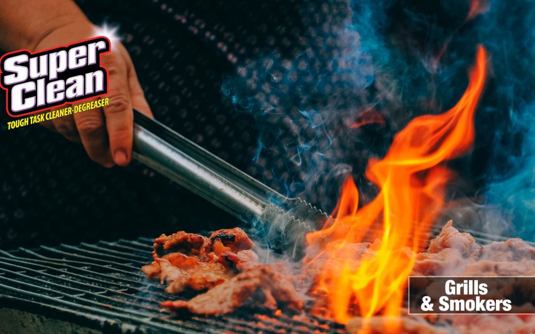 Hand with tongs grilling meat with super clean logo